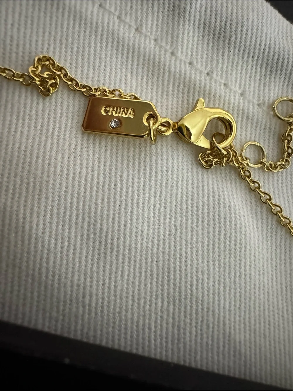 Coach Gold-Tone Logo Tag and Flower Charm Necklace